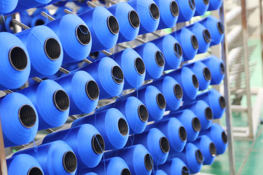 Colored yarn packages in FENGDA production